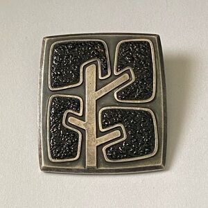 Modernist Black and Silver Tone Brooch